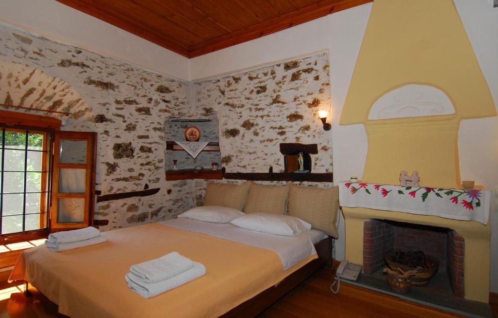Archontiko Iatridis Hotel Mourésion Quarto foto